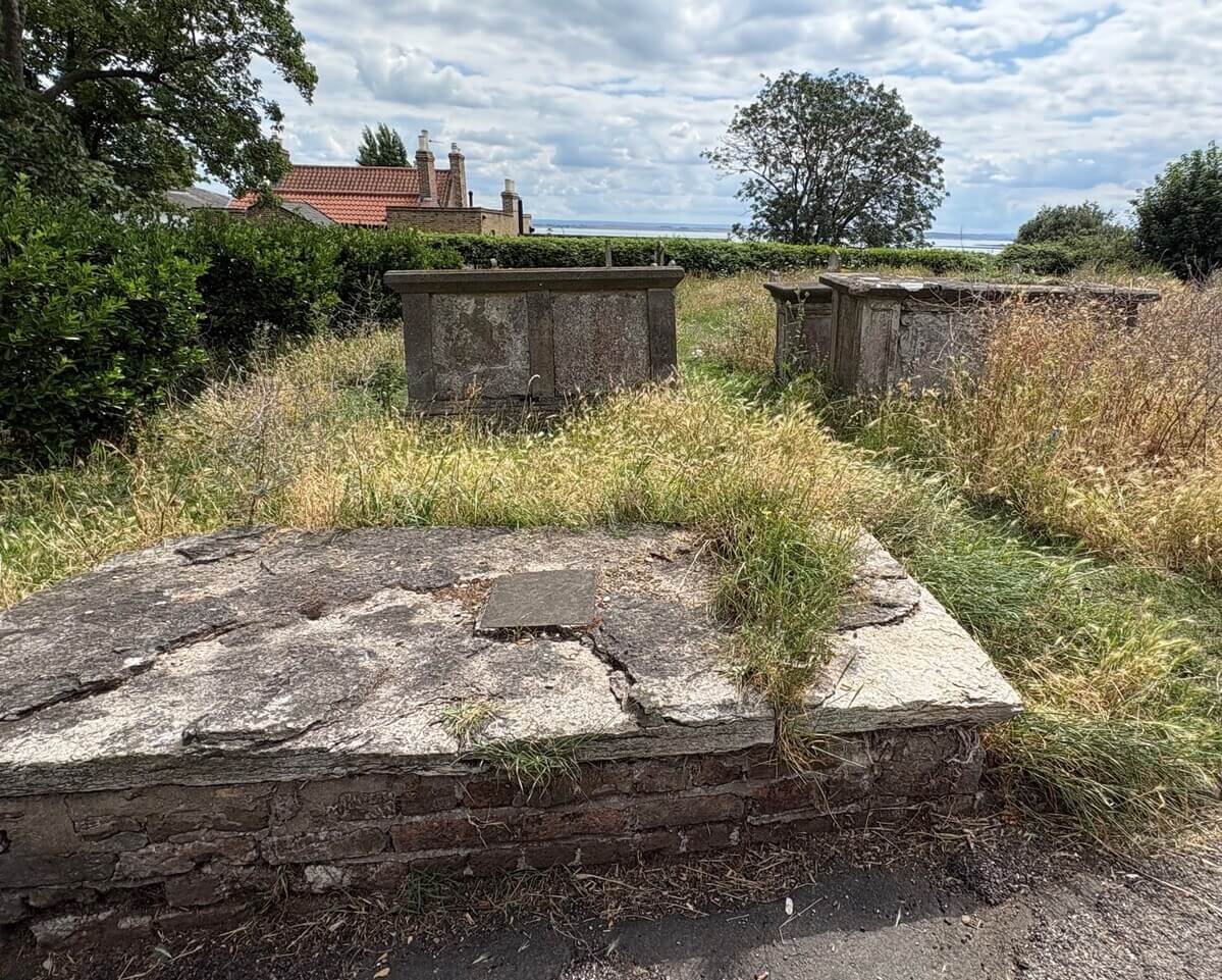 The Haddock tombs in the southeast corner of St. Clement’s churchyard, Leigh-on-Sea, Essex, looking south toward the Thames Estuary